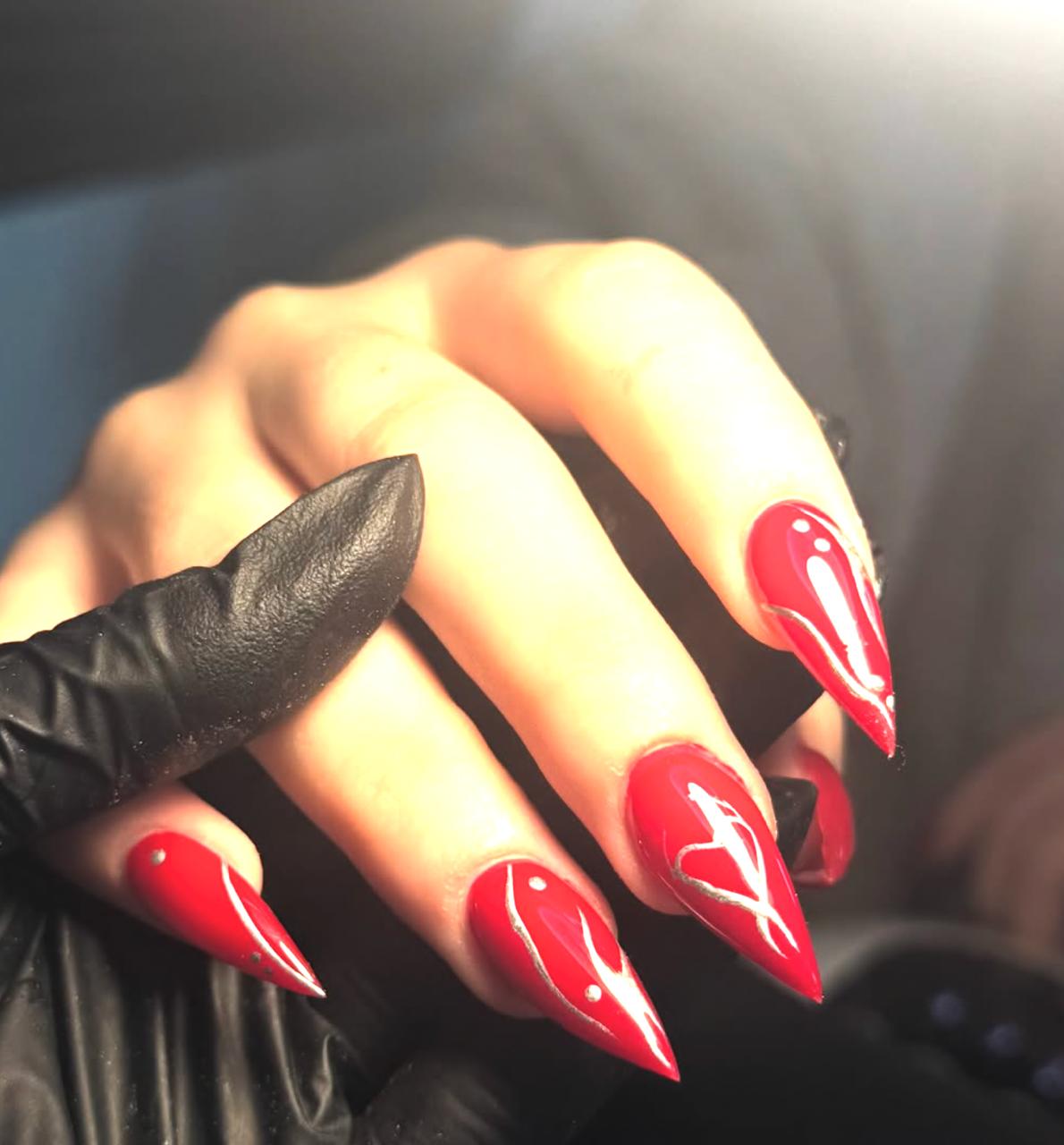 Red acrylic nail art set by Design by Eva in Staveley