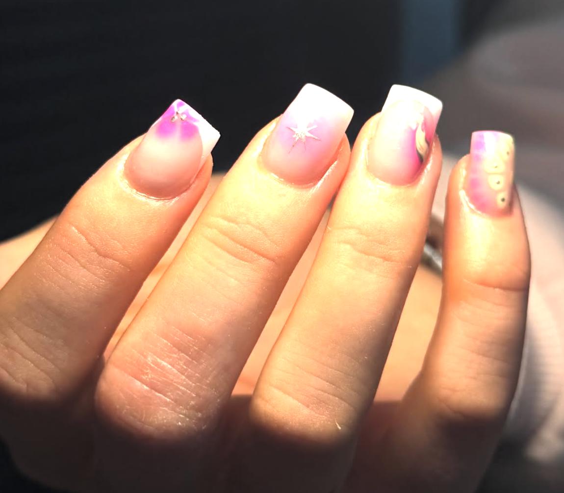 Glossy nail design by Design by Eva in Chesterfield